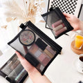 Arenzza Selleasy portable mesh cosmetics storage bag with multiple compartments, ideal for organizing beauty and skincare products.
