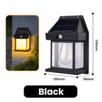 Arenzza solar wall light with motion sensor, weatherproof design, installed on outdoor garden wall, dusk to dawn operation.