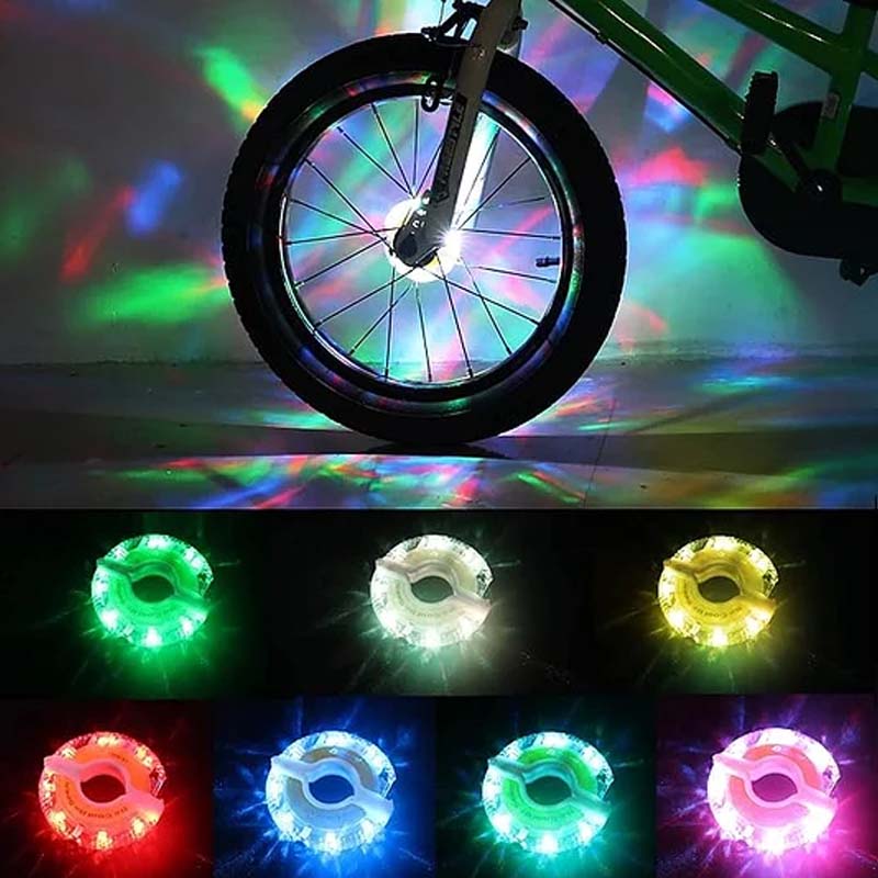 Arenzza LED cycling wheel hub light installed on a bike wheel, glowing brightly during night riding for visibility and safety.
