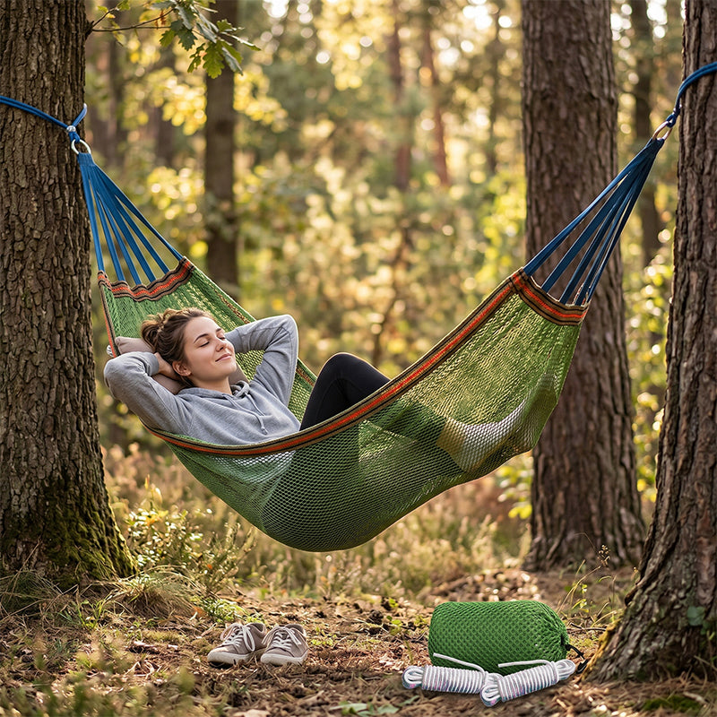 Arenzza upgraded camping hammock with ropes shown hanging outdoors, highlighting its durable fabric and sturdy support system.