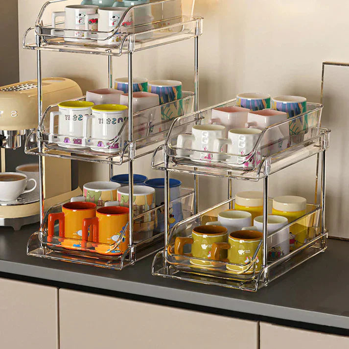 Acrylic pull-out storage organizer with multiple compartments for practical organization of small items or cosmetics.