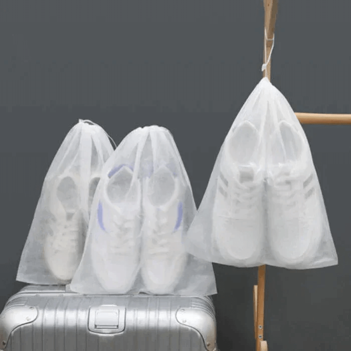 Arenzza reusable drawstring shoe storage bags in black, with adjustable drawstrings and breathable fabric, ideal for organizing shoes.