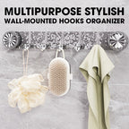 Arenzza multipurpose wall-mounted hooks organizer with multiple hooks for storage and organization on a stylish wall.