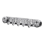 Aarenza multipurpose wall-mounted hooks organizer with multiple hooks for storage and organization on a plain wall.