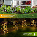 Colorful LuminaGlow Solar Firework Garden Lights by Arenzza, waterproof starburst stake lamps illuminating paths and patios at night.