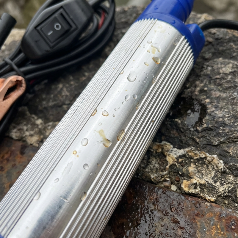 Arenzza portable submersible electric pump with alligator clips, compact tool for gardening and fluid transfer applications.