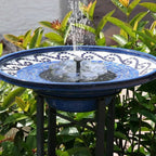 Arenzza solar-powered garden fountain with a compact design, featuring a water spout and solar panel in a lush garden setting