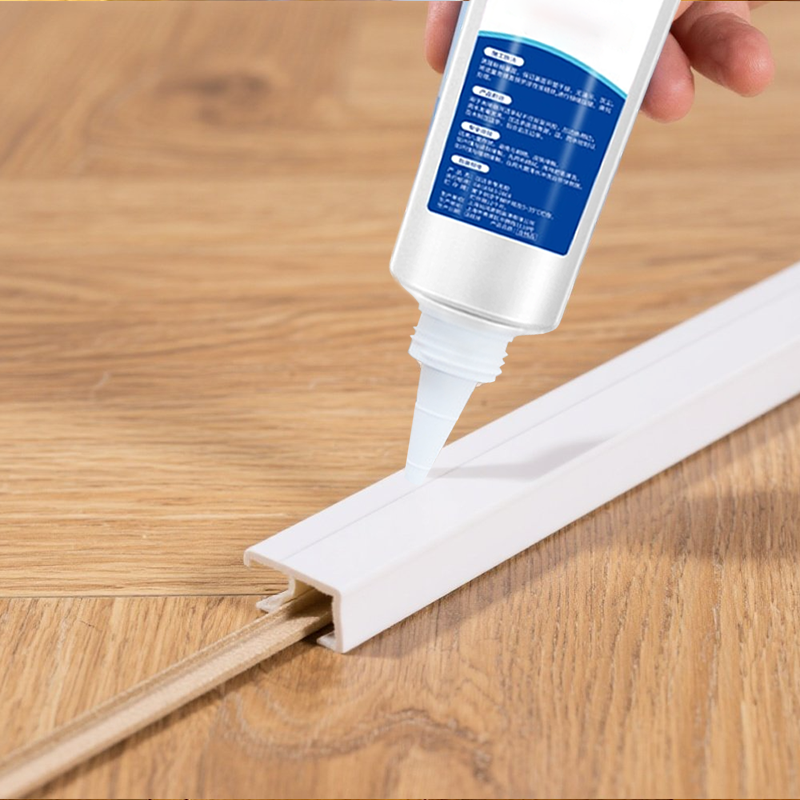 Arenzza Edge Strip Anti-Detachment Glue tube, a tools and garden adhesive product for securing edge strips in DIY projects.