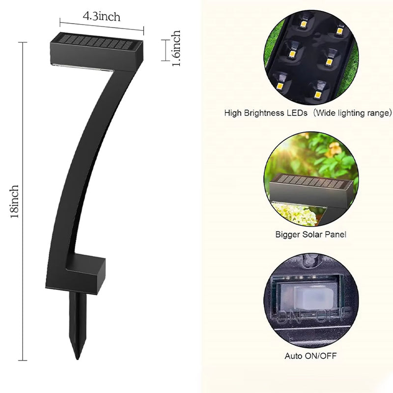 Aarenza waterproof solar pathway lights illuminating a garden walkway with warm LED glow in a garden setting.