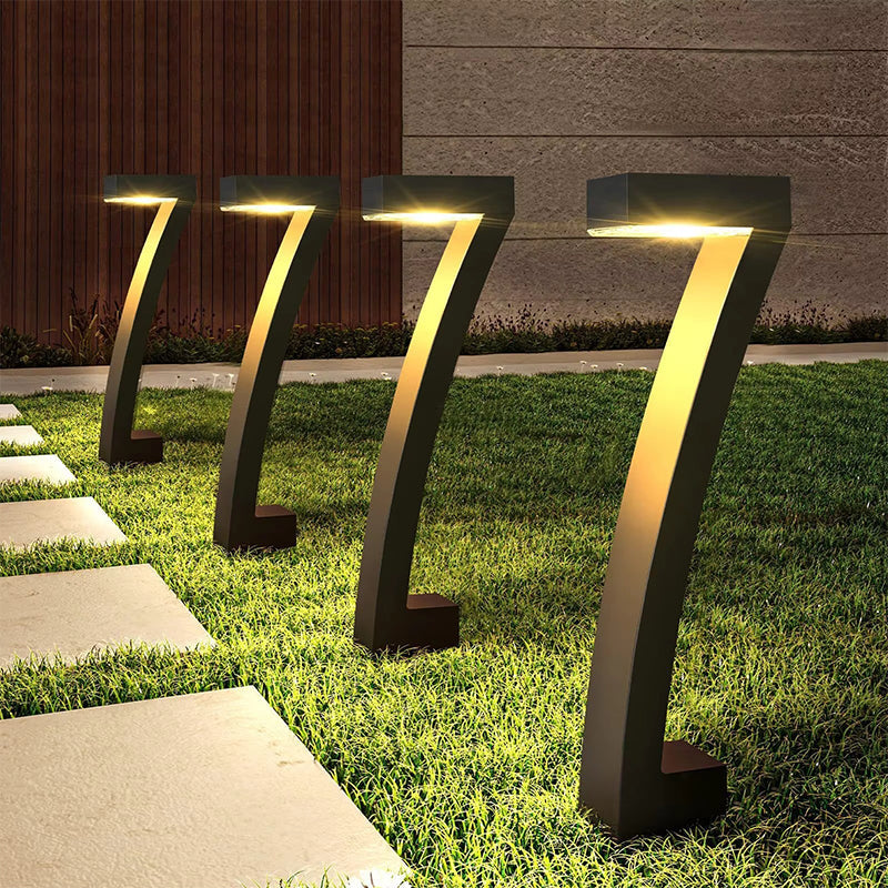 Aarenza waterproof solar pathway lights in garden setting, illuminating a stone walkway with bright LED lights for outdoor lighting.