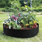 Arenzza fabric round raised garden bed planter for herbs, flowers, vegetables, potatoes, and planting in a lush outdoor garden setting.