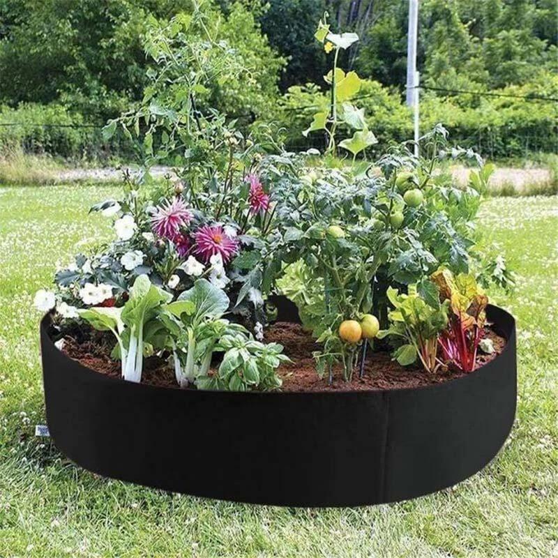 Arenzza fabric round raised garden bed planter for herbs, flowers, vegetables, potatoes, and planting in a lush outdoor garden setting.