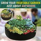 Aarenza fabric round raised garden bed planter pot with herbs, flowers, vegetables, and potatoes in a garden setting.