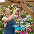 Arenzza Solar Cascade Hanging Bird Bath Fountain in garden, featuring a decorative bird bath with flowing water and solar-powered pump.