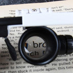 Arenzza LED Glasses Magnifier with 23x zoom, featuring built-in LED lights, designed for detailed viewing and precision work.