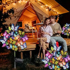 Arenzza solar outdoor butterfly garden lights glowing in a garden setting, decorative tools and garden lighting for outdoor decor.