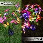 Arenzza solar outdoor butterfly lights illuminating a garden, decorative tools and garden accessories in a sunny outdoor setting.