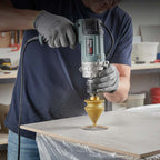 Arenzza diamond chamfering bit for angle grinder, shown attached to grinder, designed for precise edge shaping in tools and garden projects.