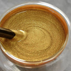 Arenzza weather-resistant water-based gold paint can and brush set for tools and garden projects, with a shiny gold finish.