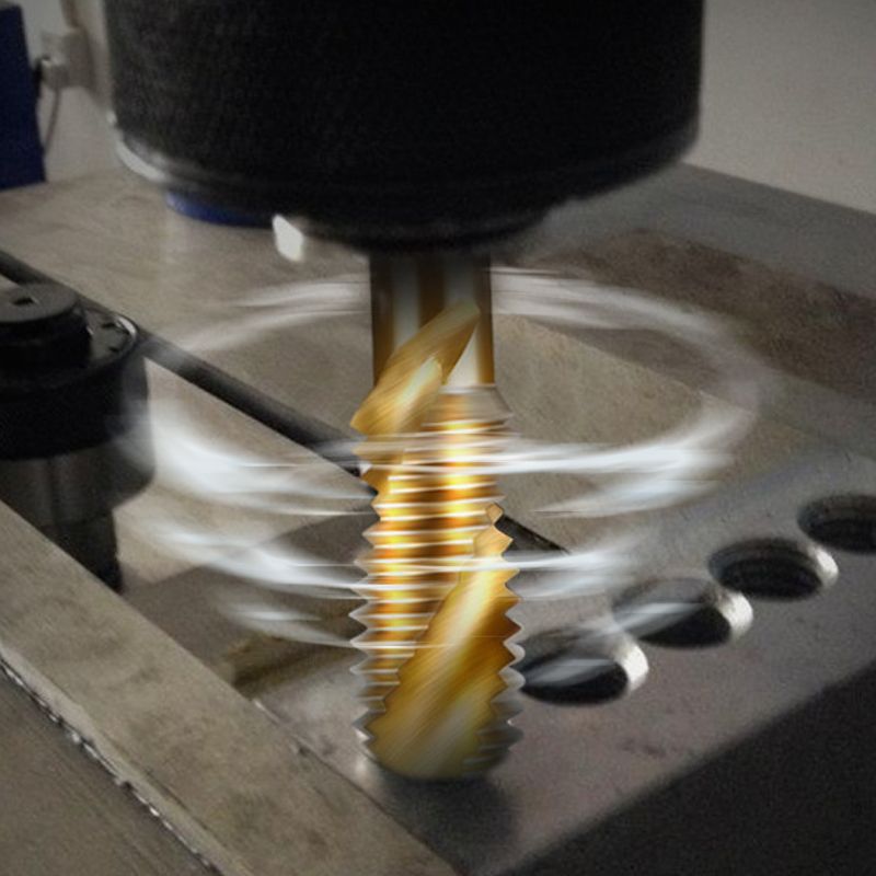A set of six Arenzza multipurpose spiral tap tools for metalworking, arranged on a workbench with various tools in the background.