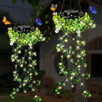 A Arenzza Solar Hanging Grass Light with realistic foliage, warm white glow, weatherproof IP65, suitable for garden decor and outdoor lighting.