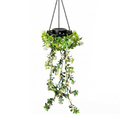 A garden solar hanging light with realistic green foliage and warm white illumination, rated IP65 for outdoor use.