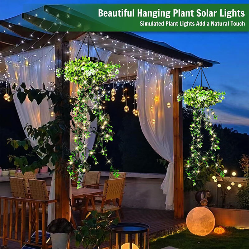 Aarenza solar hanging grass light with realistic foliage and warm white illumination, suitable for garden outdoor lighting, IP65 rated.