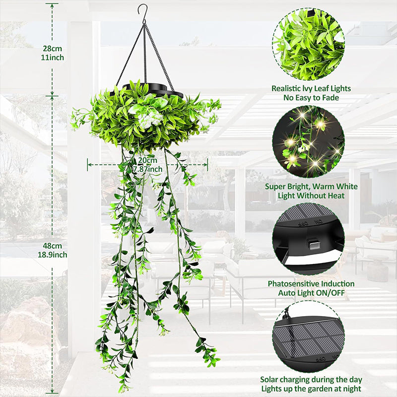 Aarenza solar hanging grass light with realistic green foliage and warm white illumination, weatherproof IP65 garden decor.