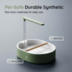 Arenzza electric bird bath with shower and perch in a garden setting, featuring a sleek design and water basin for bird bathing.