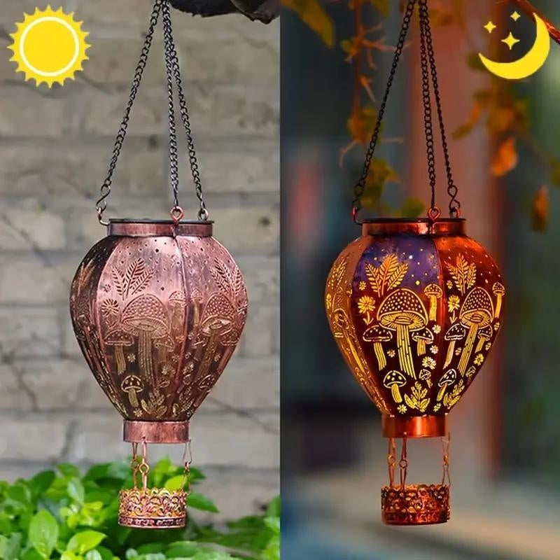 Aarenza solar-powered hot air balloon lantern in tools and garden, featuring a colorful balloon-shaped design with solar panel base.