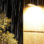 Arenzza outdoor solar clip light with motion sensor, eco-friendly garden tool for automatic outdoor lighting at night.