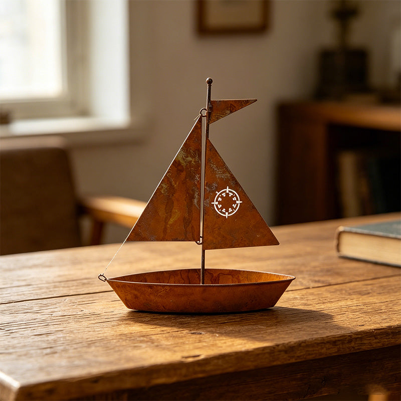 Rustic Arenzza sailboat metal planter with weather-resistant finish, ideal for succulents, herbs, or flowers, perfect for garden or shelf decor.