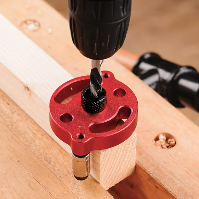 Arenzza self-centering dowel jig kit for precision drilling and perfect wood joints, showing the jig and drill bits on a work surface.