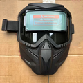 Arenzza auto-darkening welding mask with adjustable headband and protective viewing window for safe welding work.