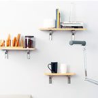 Arenzza instant fold multi-use bracket in a kitchen, showing its sturdy design and space-saving organization for decluttering.