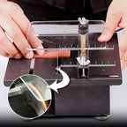 Arenzza multi-functional mini precision table saw for tools and garden projects, showing the compact saw with its blade and stand.