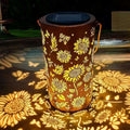 Aarenza hanging solar shadow lantern with hollow design, outdoor tools and garden decor, illuminated at dusk