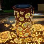 Aarenza hanging solar shadow lantern with hollow design, outdoor tools and garden decor, illuminated at dusk