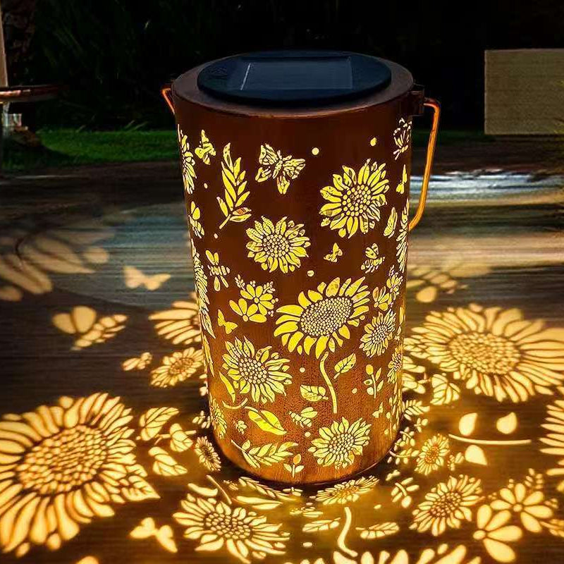 Aarenza hanging solar shadow lantern with hollow design, outdoor tools and garden decor, illuminated at dusk