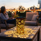 Aarenza hanging solar shadow lantern with hollow design, suitable for garden decor, showing the lantern hanging outdoors.