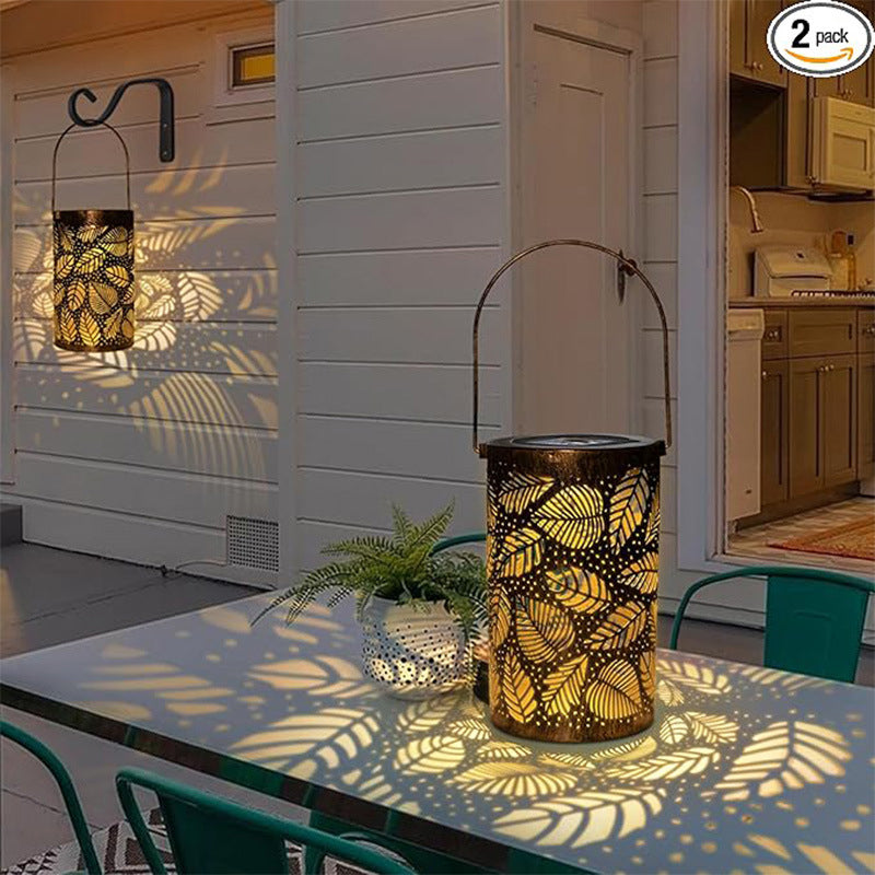 Aarenza Hanging Solar Shadow Lantern with hollow design, outdoor garden tools and lighting, decorative solar-powered lantern.