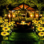 Arenzza sunflower solar lights with auto on/off, 14-hour glow, waterproof IP65, decorative garden illumination in a backyard setting.