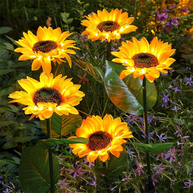 Arenzza sunflower solar lights in a garden, showing auto on/off feature, waterproof design, and 14-hour glow in outdoor tools and garden setting.