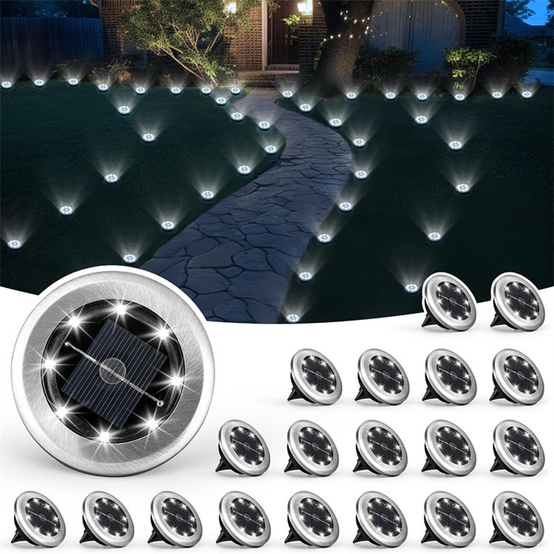 Aarenza 2-pack solar path lights in garden, showing sleek outdoor lights with solar panels, suitable for dusk-to-dawn illumination.