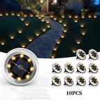 Aarenza 2-pack solar path lights in a garden setting, showcasing auto dusk-to-dawn operation and durable outdoor design.