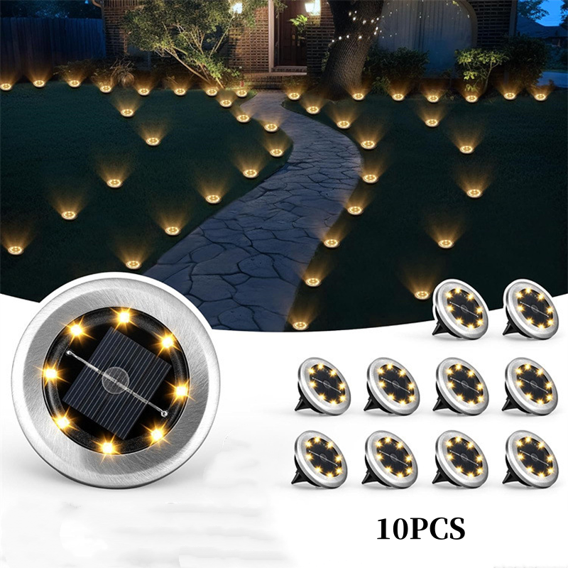 Aarenza 2-pack solar path lights in a garden setting, showcasing auto dusk-to-dawn operation and durable outdoor design.