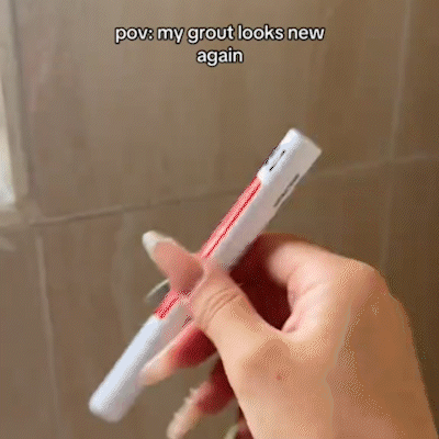 Arenzza Tile Marker Grout Pen in black, used for sealing and touching up grout lines in bathroom or kitchen tiles.