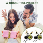 Arenzza outdoor hanging solar bee light with black metal frame and warm LED glow, perfect for garden or patio decoration.