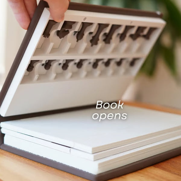 Magnetic chess set in a compact box by Arenzza, ideal for kids and travel, featuring black and white chess pieces inside.
