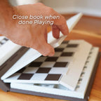 Arenzza magnetic chess box toy for kids, featuring a compact black and white chessboard with magnetic chess pieces inside.